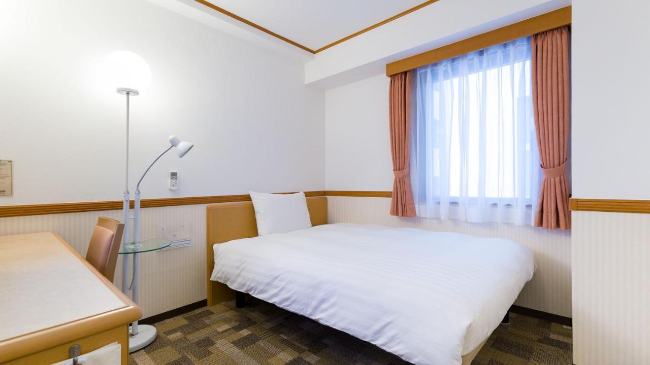 Toyoko Inn Kagoshima Chuo Eki Nishi Guchi Bagian luar foto
