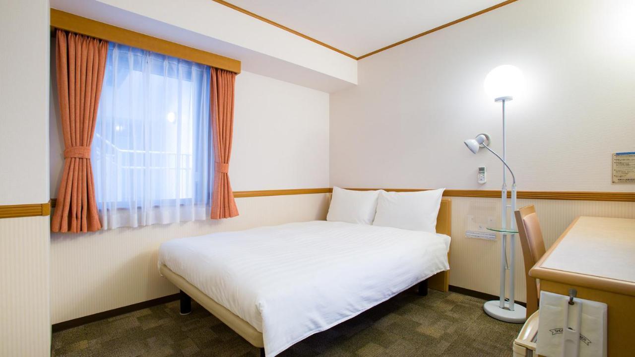 Toyoko Inn Kagoshima Chuo Eki Nishi Guchi Bagian luar foto