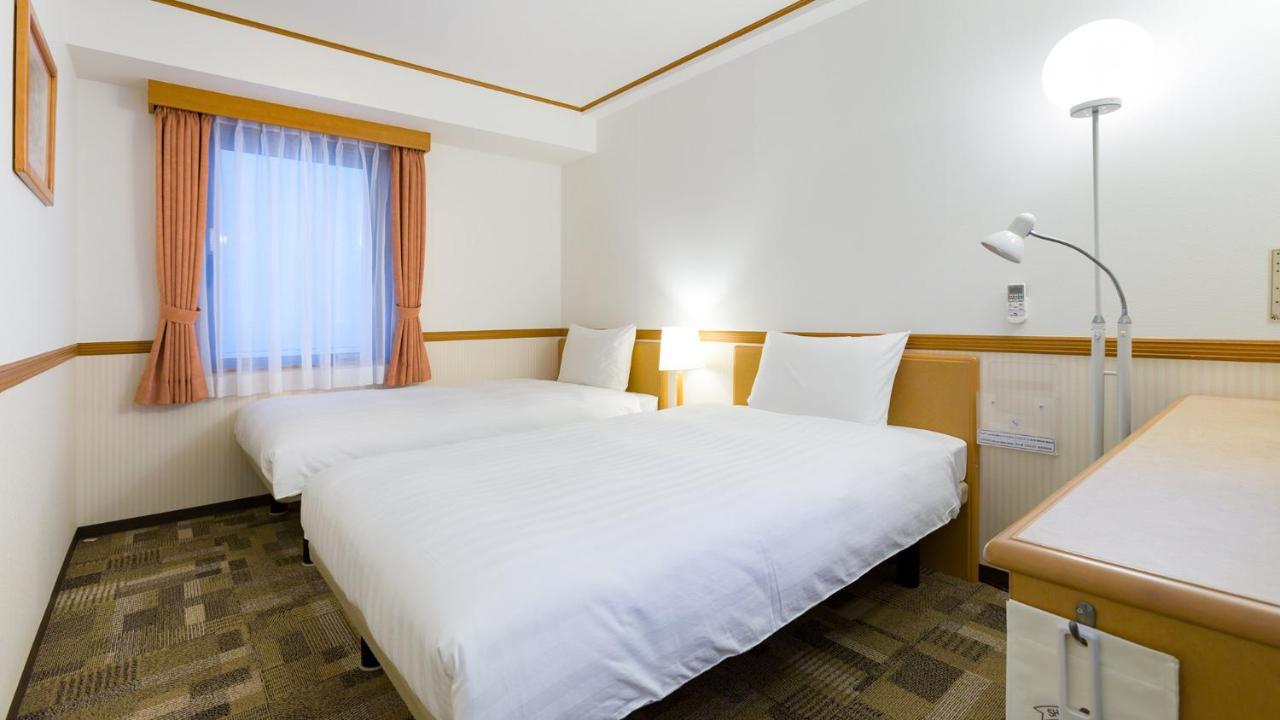 Toyoko Inn Kagoshima Chuo Eki Nishi Guchi Bagian luar foto